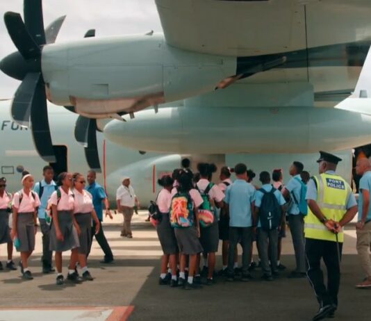 School children visit Hurricane Hunter aircraft on stopover in Saint Lucia.