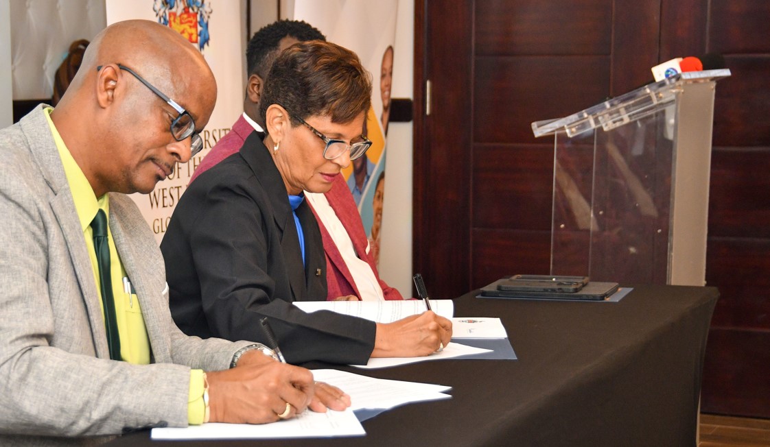 Sandals and UWI Representatives sign the Memorandum of Understanding.