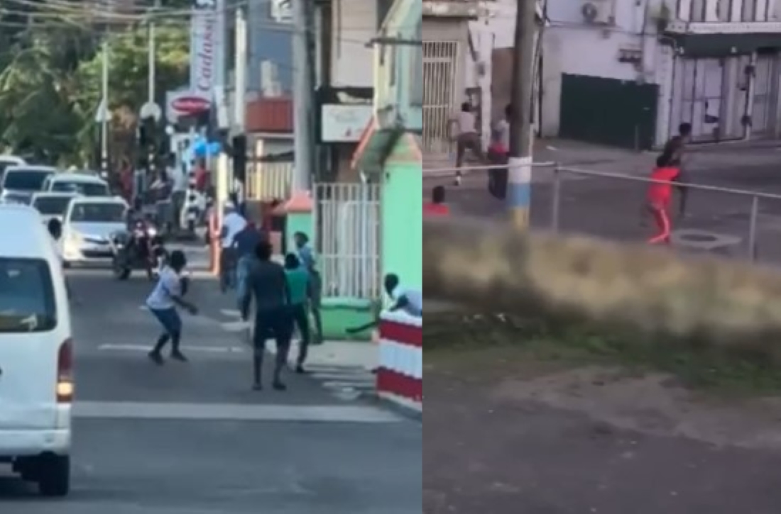 Rival groups of young men engage in skirmishes on Chaussee Road, Castries.