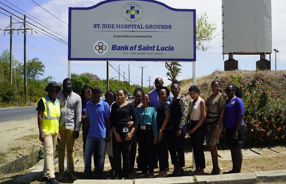 Bank of Saint Lucia and St. Jude staff pose outside the hospital.