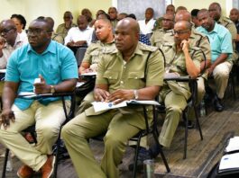 Police officers at strategic planning session.