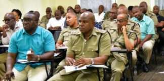 Police officers at strategic planning session.