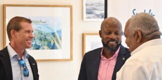 From L to R: Sandals Executive Chairman Adam Stewart, SVG Tourism Minister Carlos James, Executive VP of Sales and Industry Relations, Unique Vacations.
