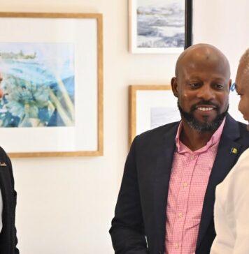 From L to R: Sandals Executive Chairman Adam Stewart, SVG Tourism Minister Carlos James, Executive VP of Sales and Industry Relations, Unique Vacations.