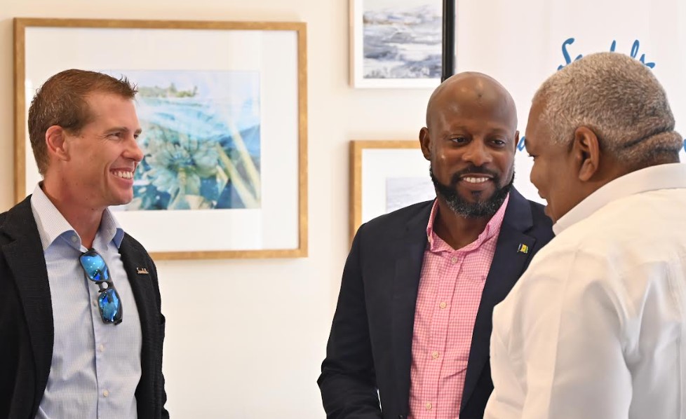 From L to R: Sandals Executive Chairman Adam Stewart, SVG Tourism Minister Carlos James, Executive VP of Sales and Industry Relations, Unique Vacations.