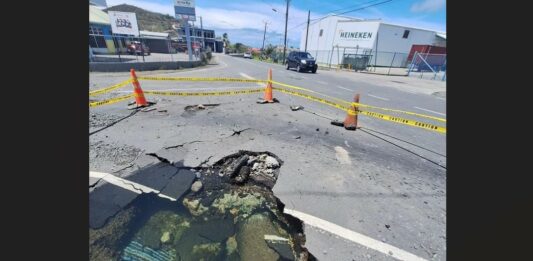 Road damage in Vieux Fort due to ruptured WASCO transmission line.