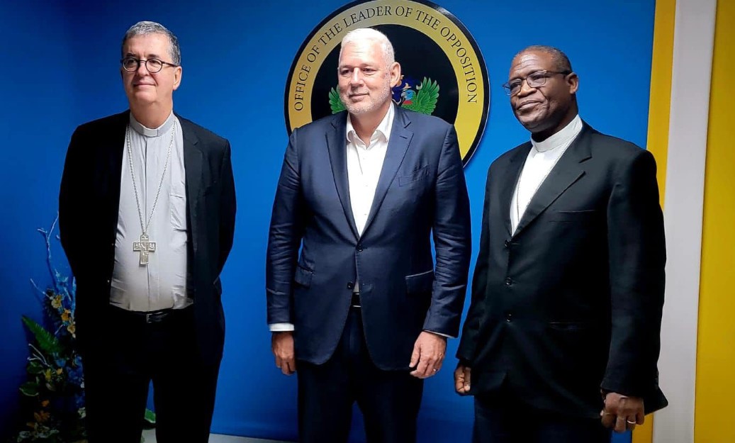 Allen Chastanet flanked by senior Roman Catholic Church officials.