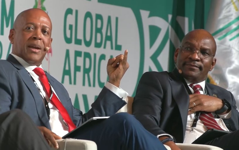 Governor of the Central Bank Dr Kevin Greenidge (left) makes a point at a panel discussion on day one of the 31st Afreximbank Annual Meetings and third edition of the AfriCaribbean Trade and Investment Forum at the Baha Mar Convention Centre, in Nassau, Bahamas. At right is Denys Denya, senior vice president at Afreximbank, one of the other panellists.