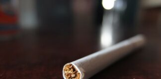One cigarette on a table.
