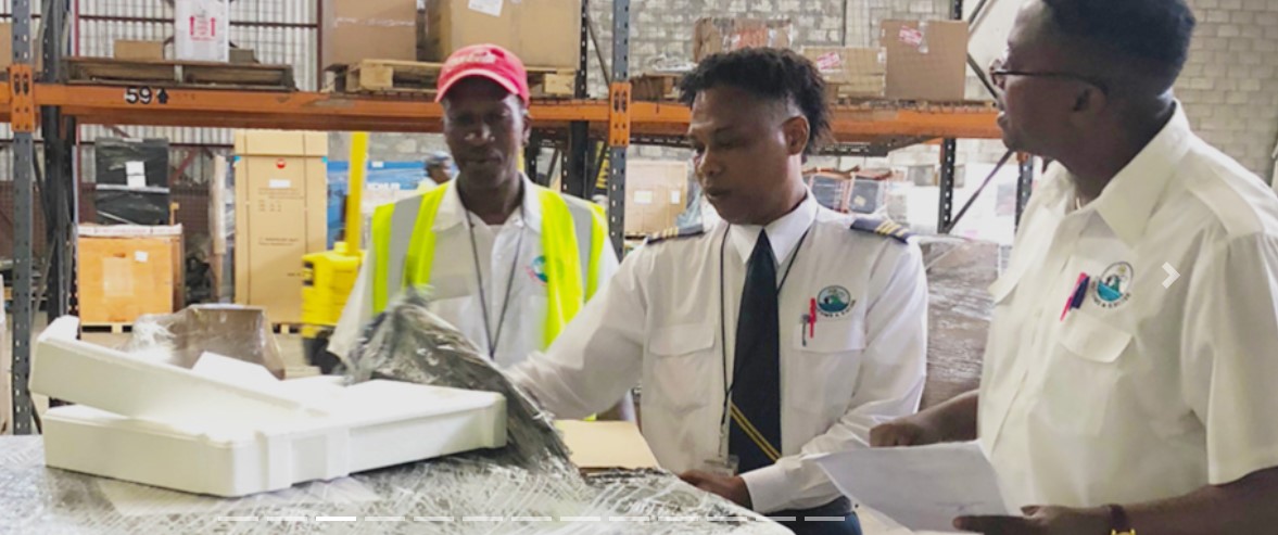 Customs Officers examine imported goods.