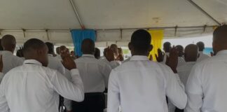 Police recruits taking oath.