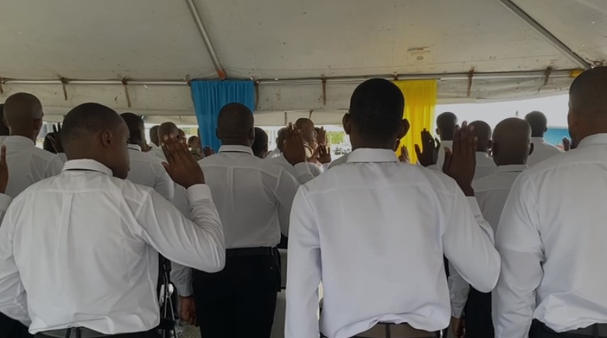 Police recruits taking oath.