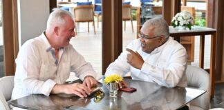 Captions - From L to R: Inter-Caribbean Airlines CEO Trevor Sadler speaks with Gary Sadler, Executive VP of Sales and Industry Relations at Unique Vacations Inc., an affiliate of the worldwide representatives of Sandals and Beaches Resorts.