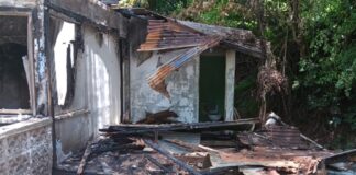 Partially destroyed house after fire at Bois Cachet.