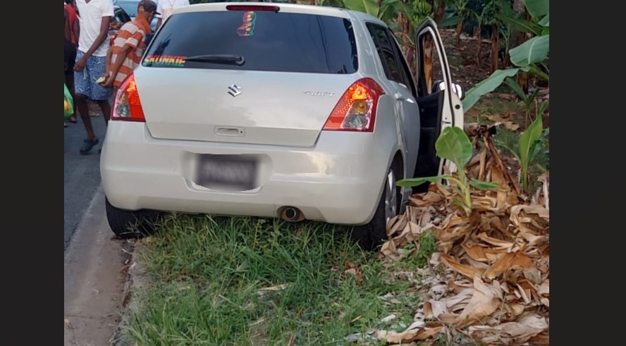 Vehicle ambushed at Dennery where two men were fatally shot.