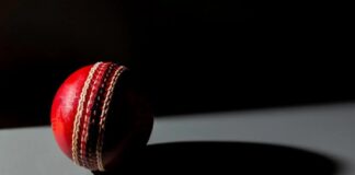 Close up of red cricket ball