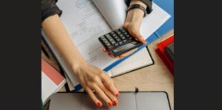 Woman with calculator