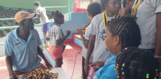 Cuthbert Modeste (Left) with summer camp attendees.