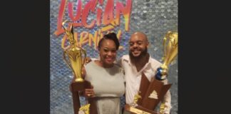 Calypso Monarch and runner up pose with their awards.