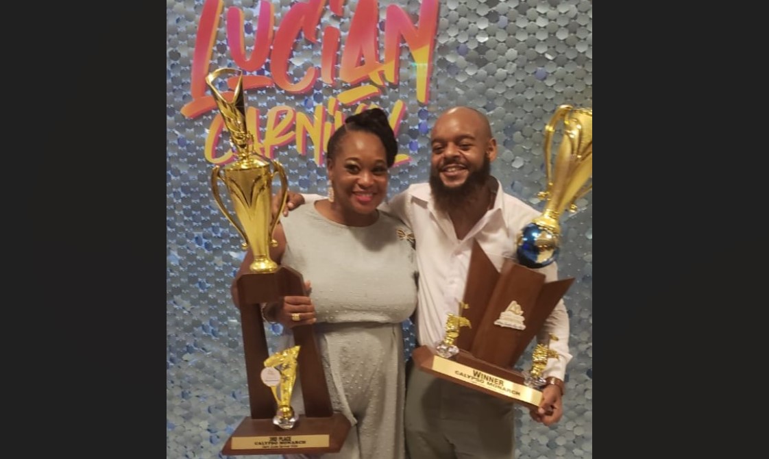 Calypso Monarch and runner up pose with their awards.