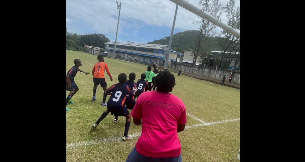 Football action in police 'Kick Our Crime and Violence' initiative.