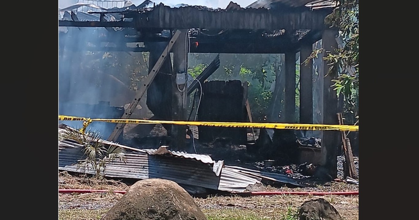 Charred remains of house after fire in Praslin.