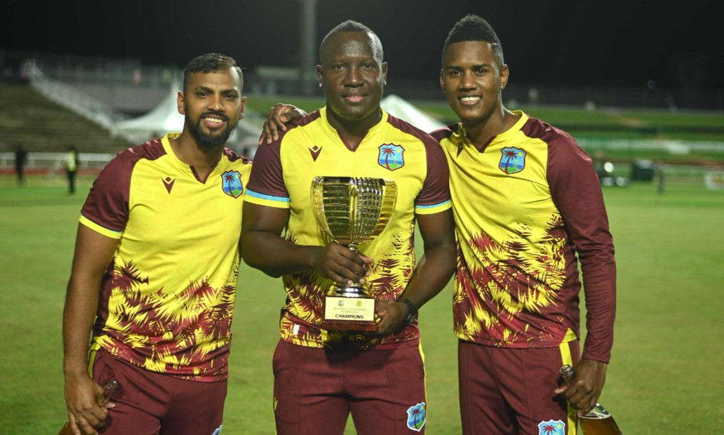 West Indies players with winning trophy.