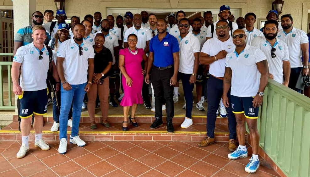 Saint Lucia Kings team members pose outside Bay Gardens resort