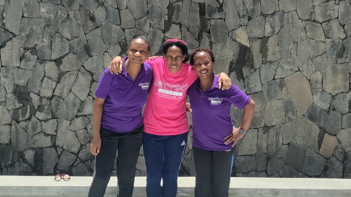 Nova Alexander (middle), Founder and Executive Director of Sacred Sports Foundation.