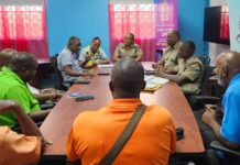 Police and NCOPT officials hold meeting.