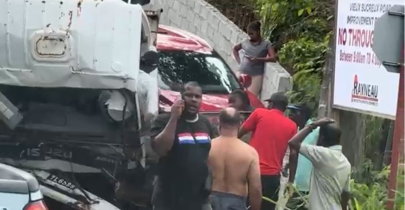 Driver injured as truck collides with backhoe