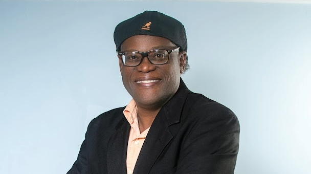 Editorial: Celebrating Cultural Storytelling – Why Kirk Elliott Deserves the GIMIES People’s Choice Award