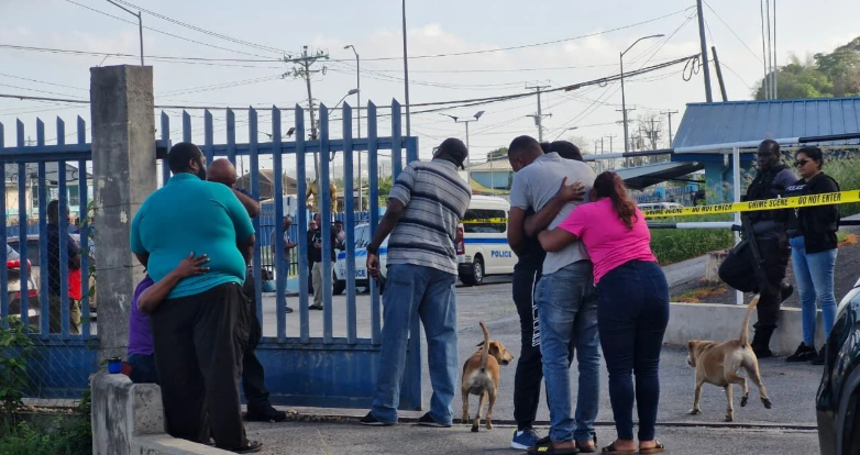 Trinidad police officer murdered in station, 68 guns taken