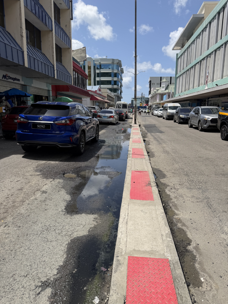Wastewater seeping onto Bridge Street raises health concerns among vendors
