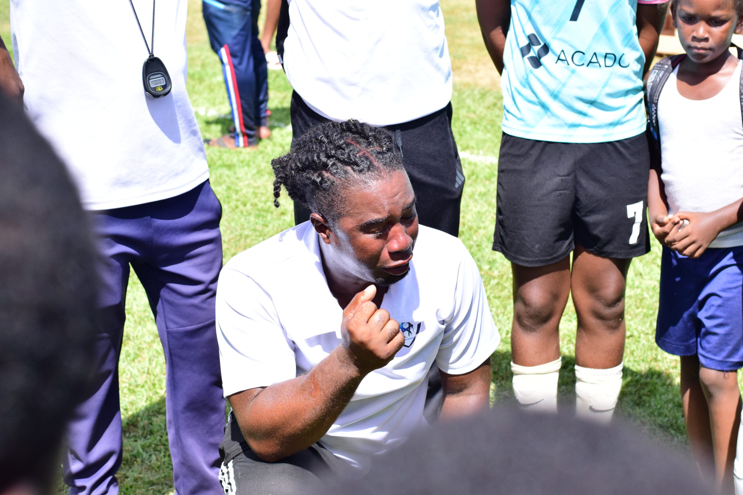 Coach Flo, doing it for the kids